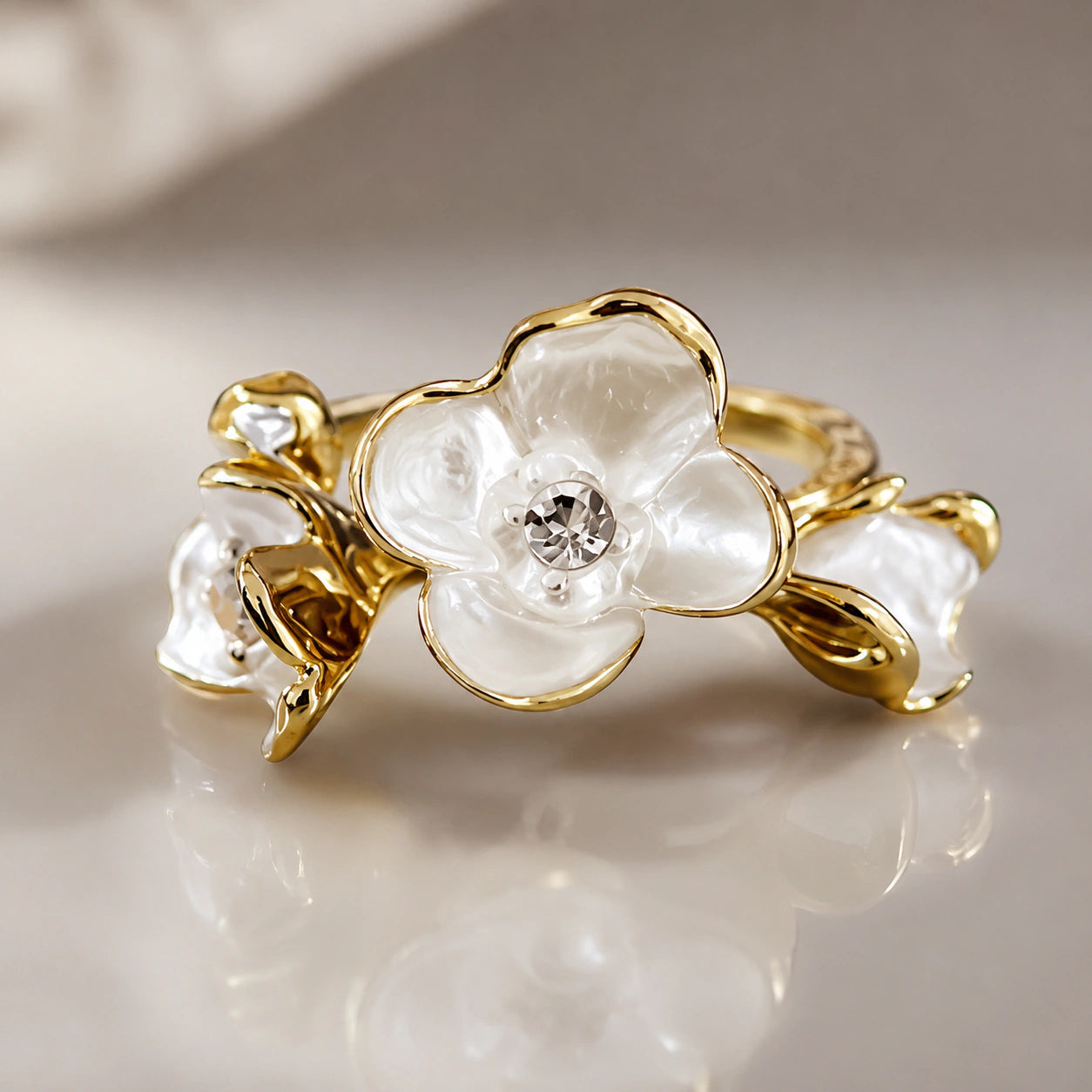 Side view of the pearl-white floral crystal ring
