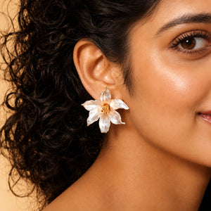 Alternate product view of pearl-white gold-edged floral statement earrings