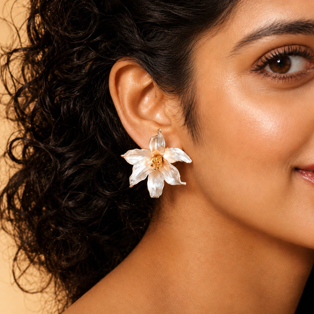 Alternate product view of pearl-white gold-edged floral statement earrings