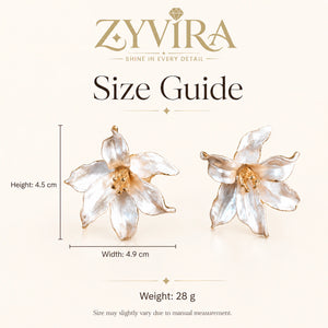 Close-up of pearl-white sculptural petals and gold-tone edging