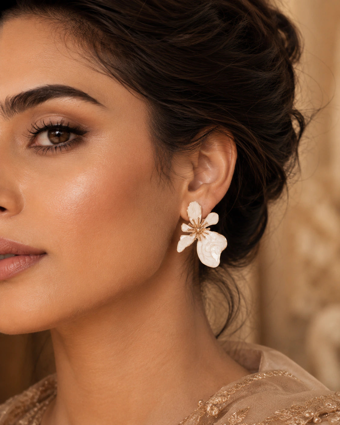 Alternate model view of pearl-white marbled floral drop earrings