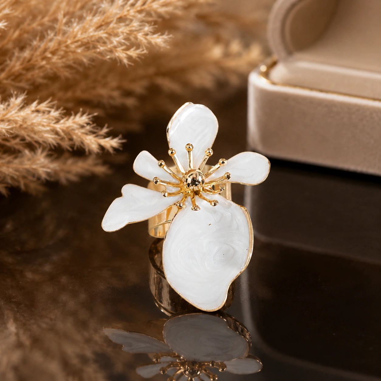 Angled view of the pearl-white marbled petal ring