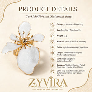 Pearl-white marbled petal ring styled in an elegant jewellery flat lay