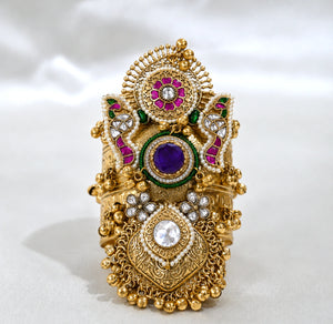 Close-up of the pearl accents on the purple Kundan kada