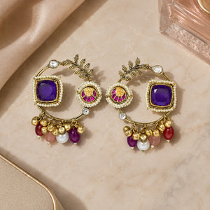 Product details card for gold-tone purple pearl chandbali earrings