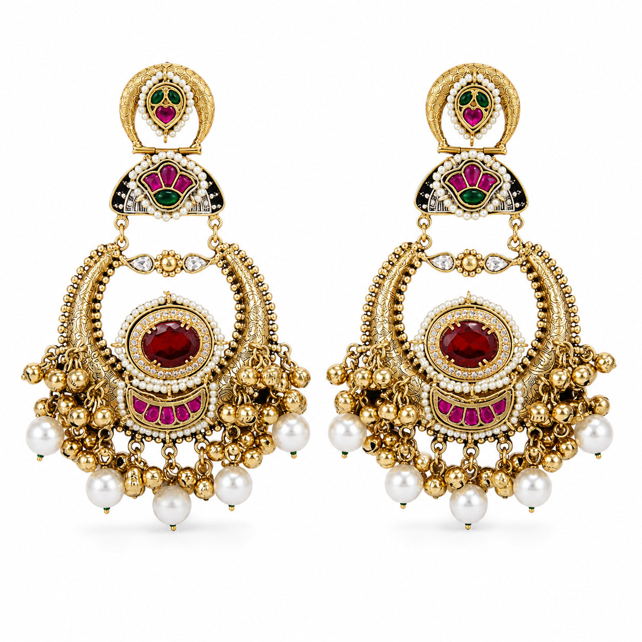 Angled view of red-stone chandbali earrings with pearl-style hanging details