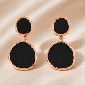 Close-up of black inlay panels and rose-gold detailing