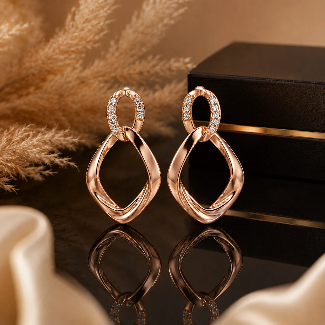 Rose-gold crystal twisted teardrop dangle earrings