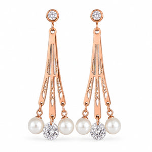 Angled view of rose-gold pearl crystal chandelier earrings