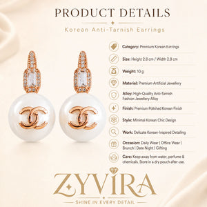 Product details card for rose-gold pearl emblem drop earrings