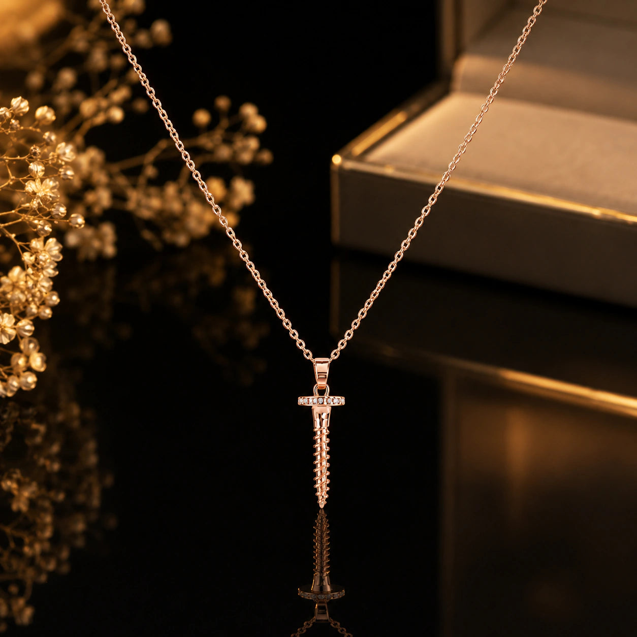 Close-up of the screw charm and crystal pendant detailing