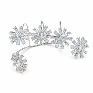 Close-up of crystal starbursts and silver-tone detailing