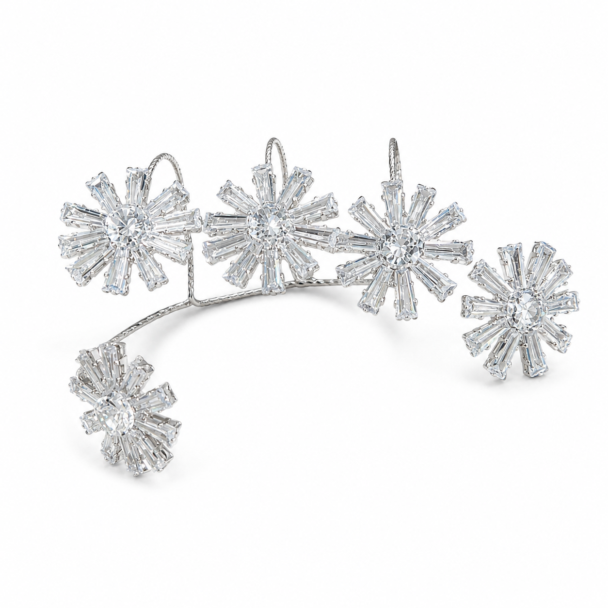 Close-up of crystal starbursts and silver-tone detailing