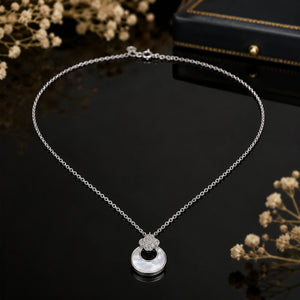 Angled view of the silver floral crystal halo necklace