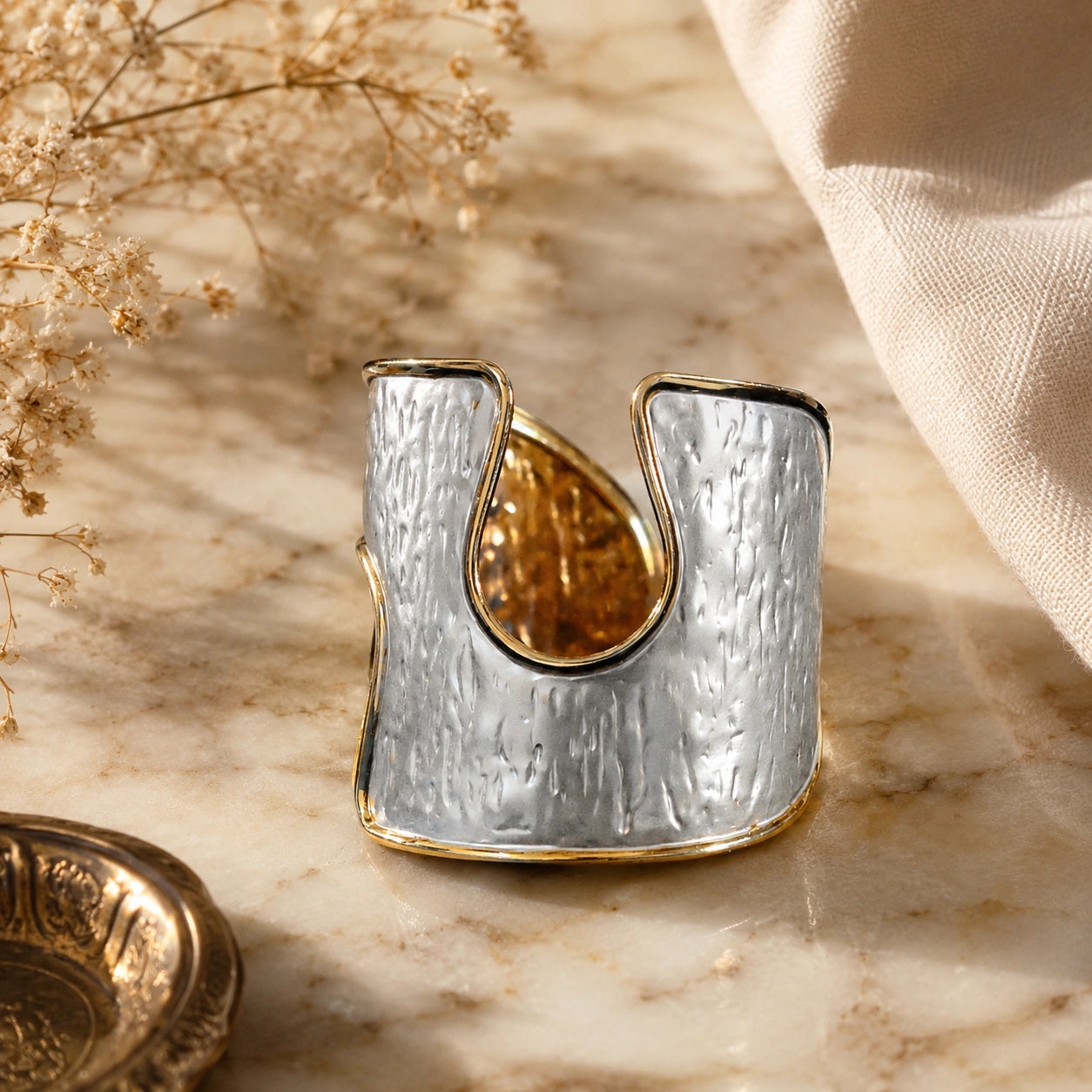 Alternate product view of the silver-and-gold hammered kada