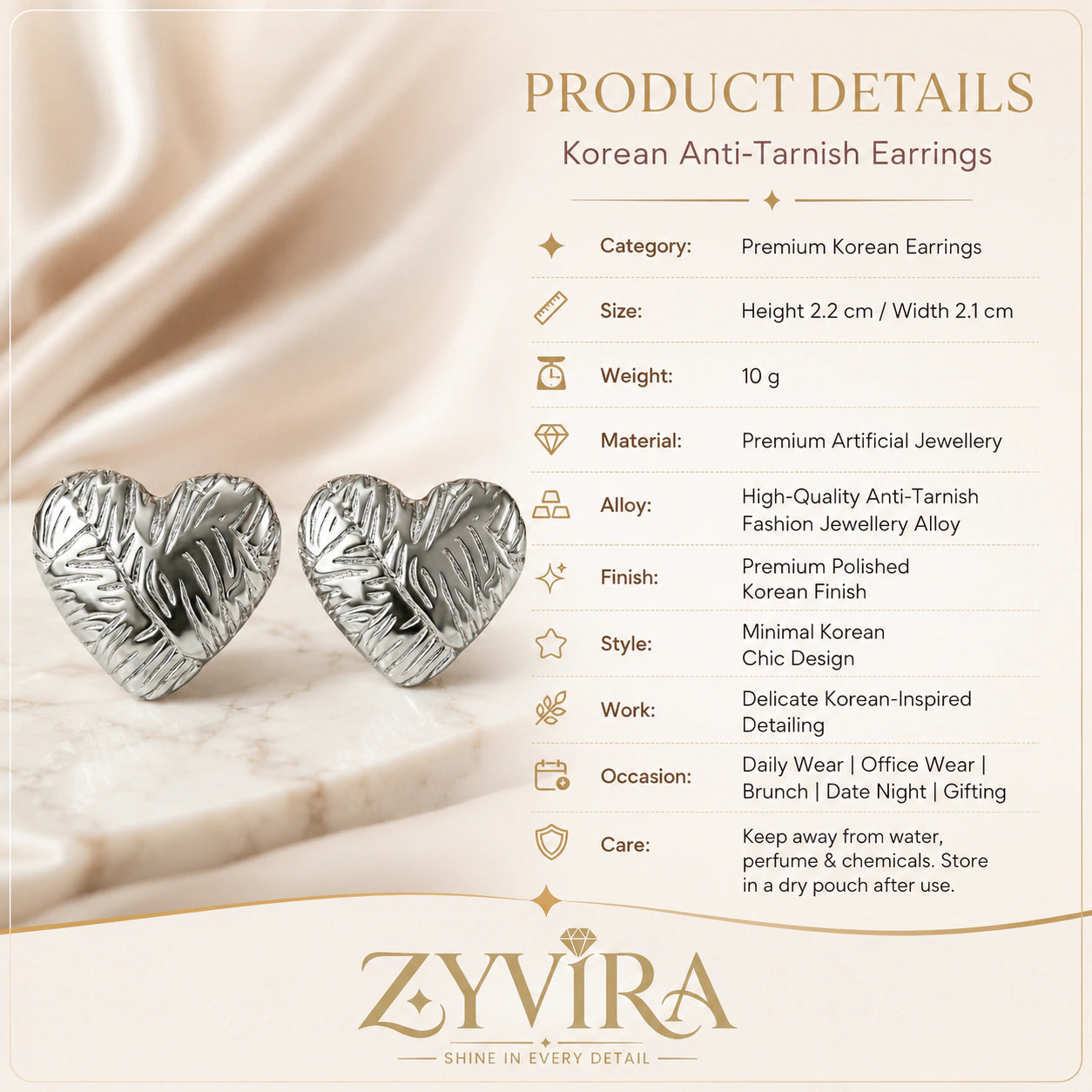 Product details card for silver leaf relief heart earrings