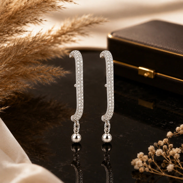 Silver pavé curved-bar ball dangle earrings