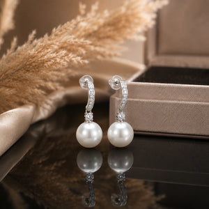 Close-up of pearl-style drops and crystal detailing