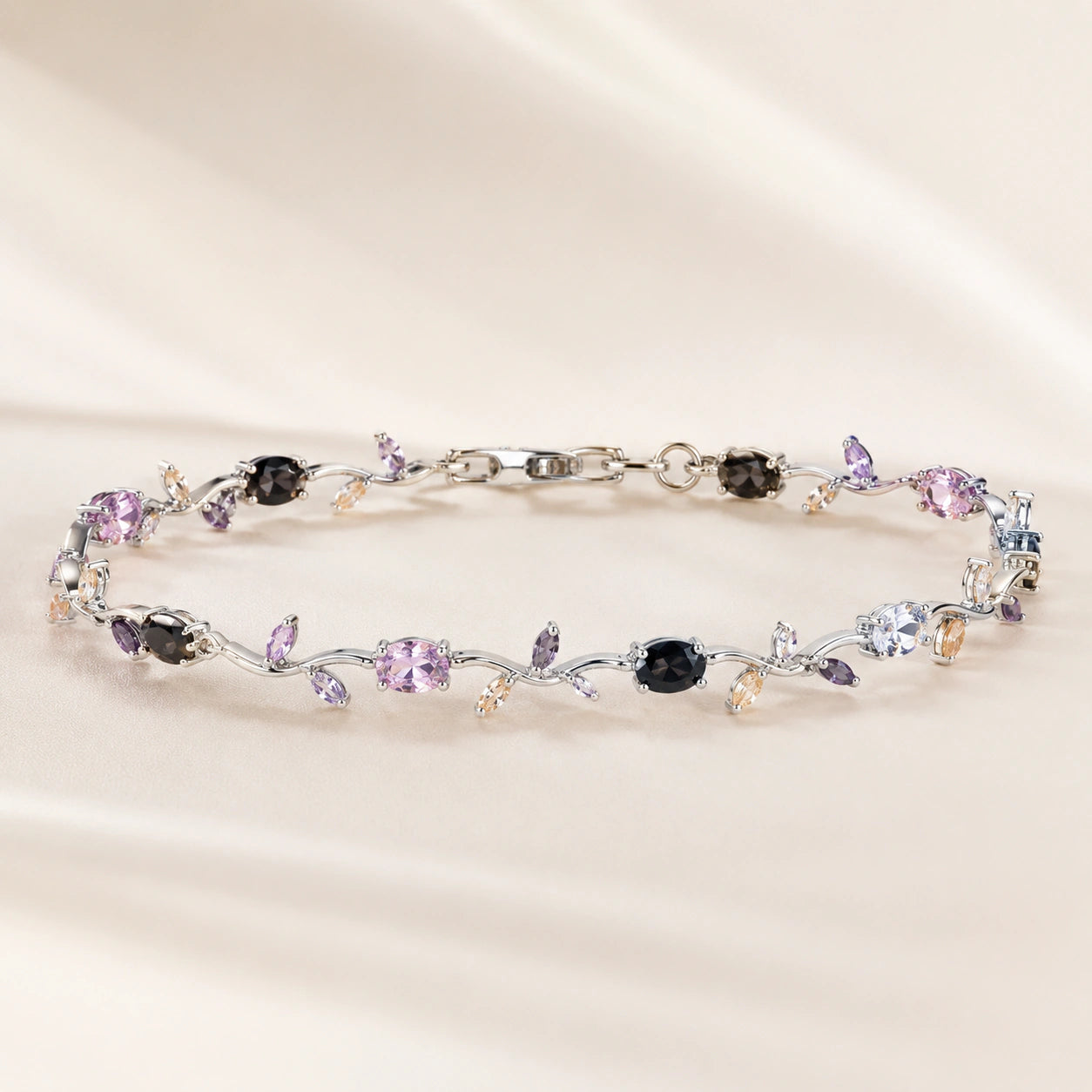 Silver tulip bracelet styled in an elegant jewellery flat lay