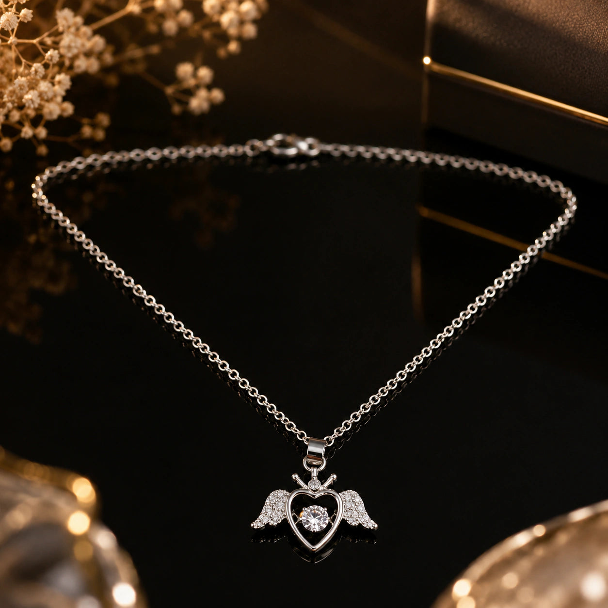 Alternate product view of the silver winged heart necklace