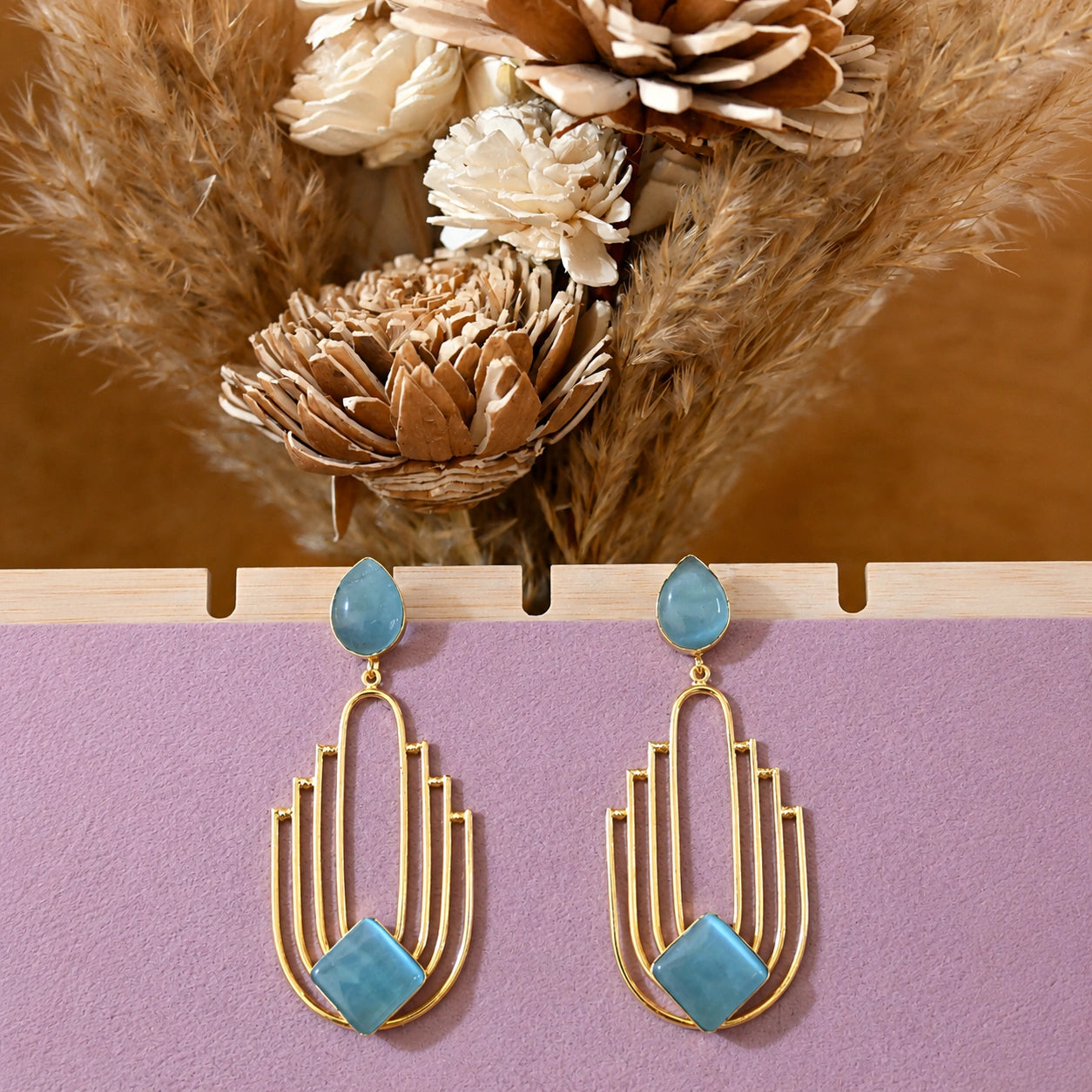 Alternate product view of sky blue gold chandelier earrings