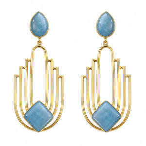 Close-up of sky blue geometric panels and gold-tone detailing