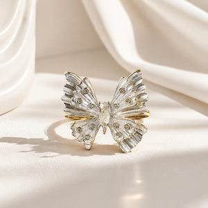 Side view of the two-tone crystal butterfly ring