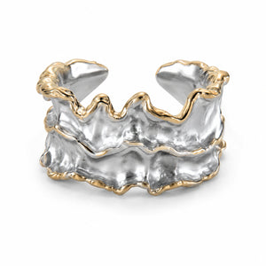 Close-up of the molten wave sculptural ring detailing