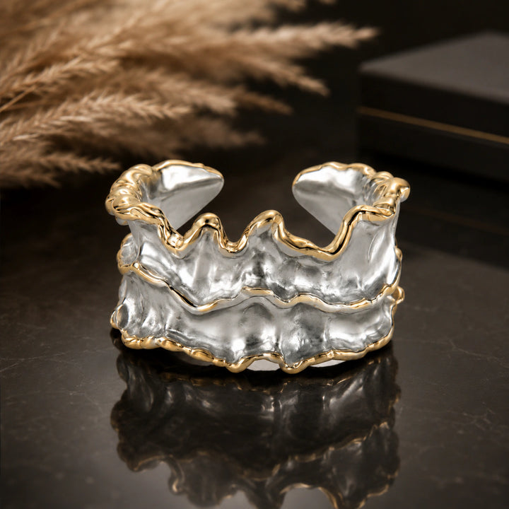 Two-tone molten wave sculptural open ring