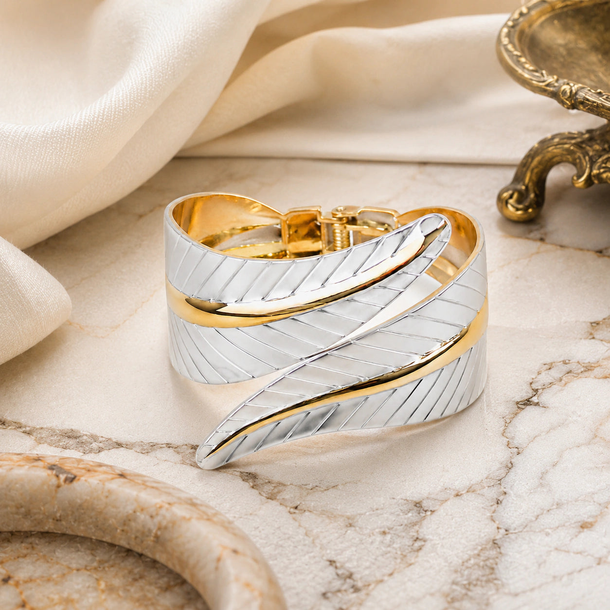 Alternate detail view of the engraved ribbon-leaf kada