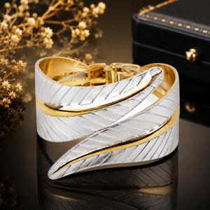 Side view of the two-tone engraved ribbon-leaf kada