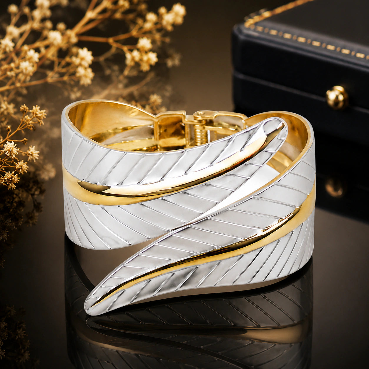 Side view of the two-tone engraved ribbon-leaf kada