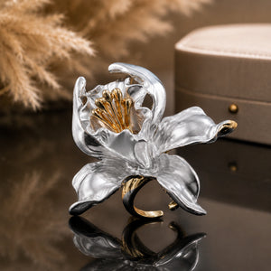 Angled view of the two-tone sculptural floral ring